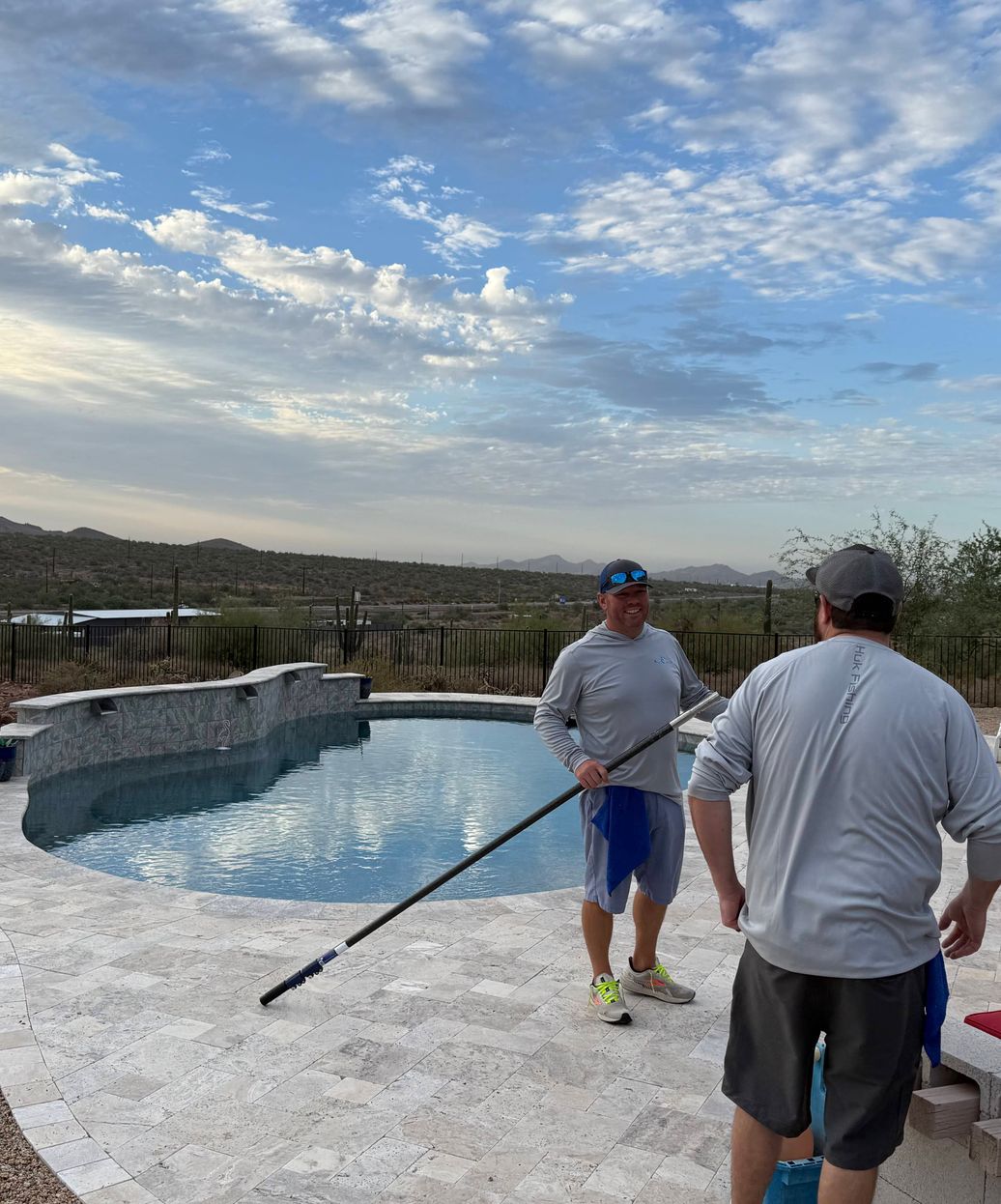 McCool's Pools team members working together